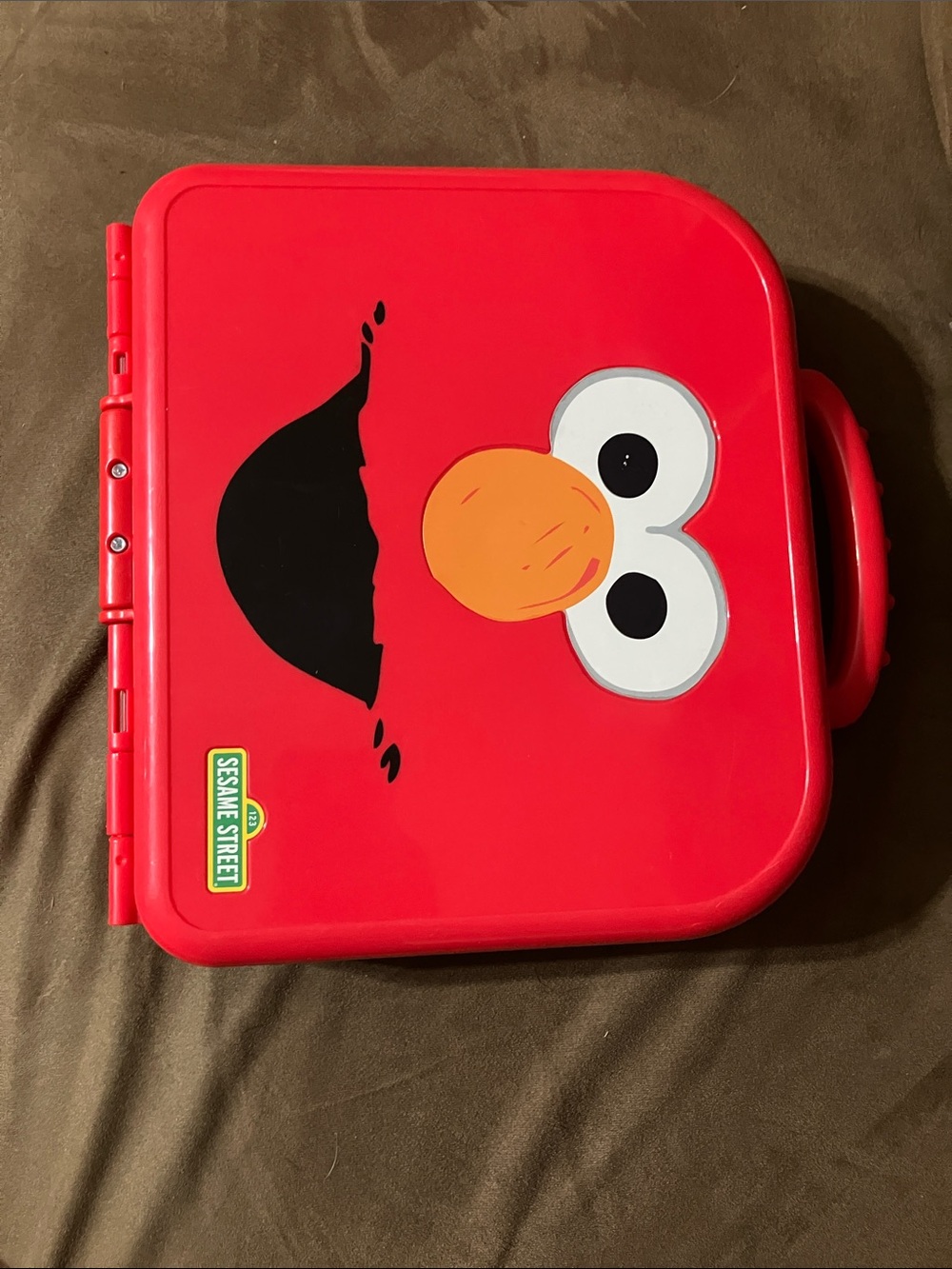 Sesame Street Elmo Red Travel Case with removable Alphabet letters.